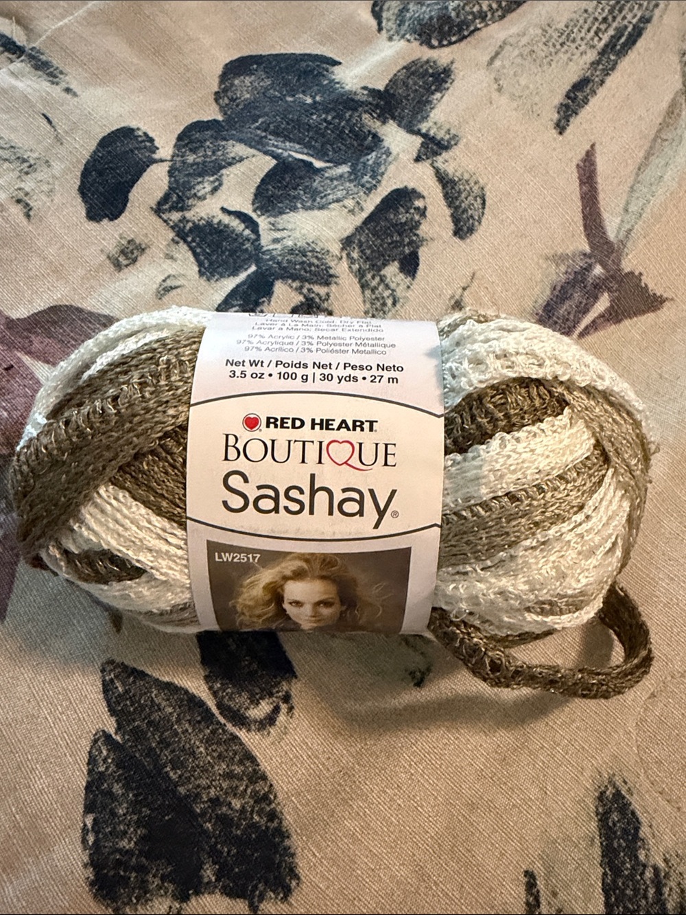 Red Heart Boutique Sashay Ribbon Yarn in Cream and Brown